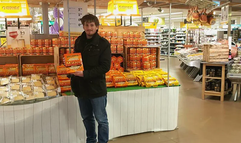 A shopper browsing for matzah at the Amsterdam Noord branch of the Jumbo supermarket chain.