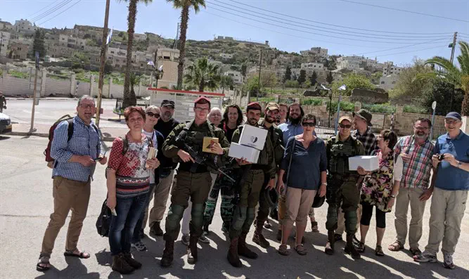 Distributing packages to soldiers in Hevron