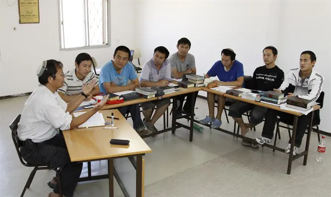 Chinese men studying Torah in Yeshivat Mivtar, preparing for orthodox conversion
