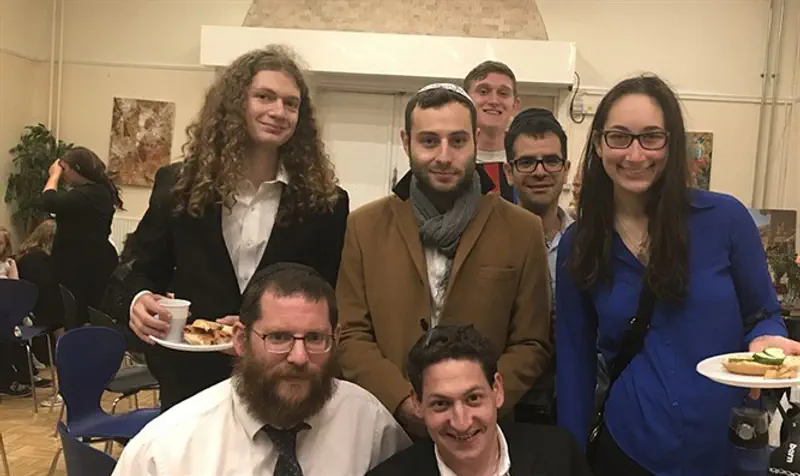 Rabbi Yitzi Loewenthal, kneeling left, and Chabad Copenhagen visitors, in March 2015.