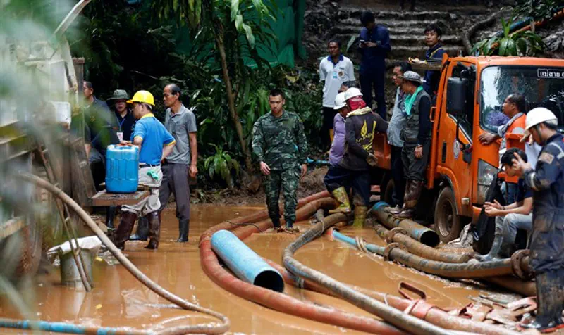 Soldiers and rescue workers work near Tham Luang cave complex