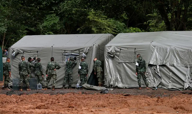 Soldiers prepare a temporary hospital near the Tham Luang cave complex