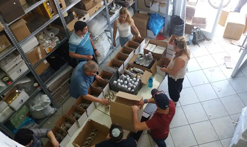 Volunteers assemble Lev HaOlam packages