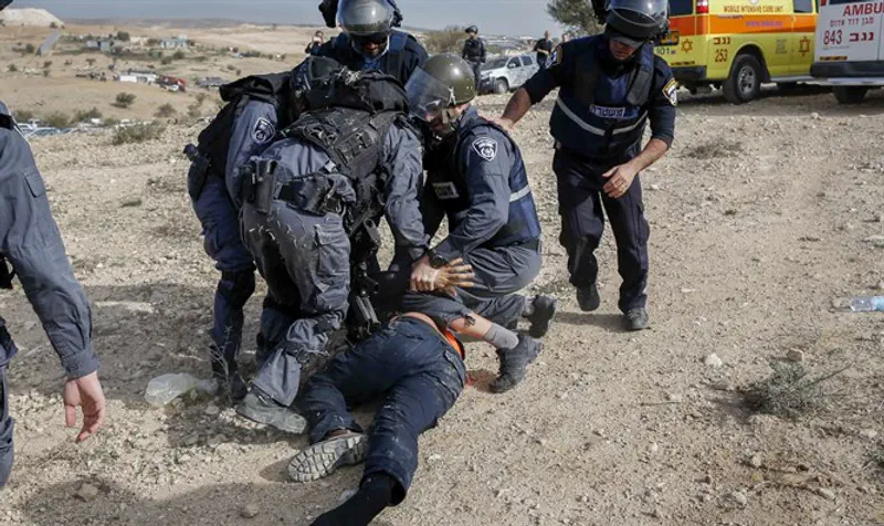 Police detain Bedouin during demolition of homes in Umm al Hiran in Negev