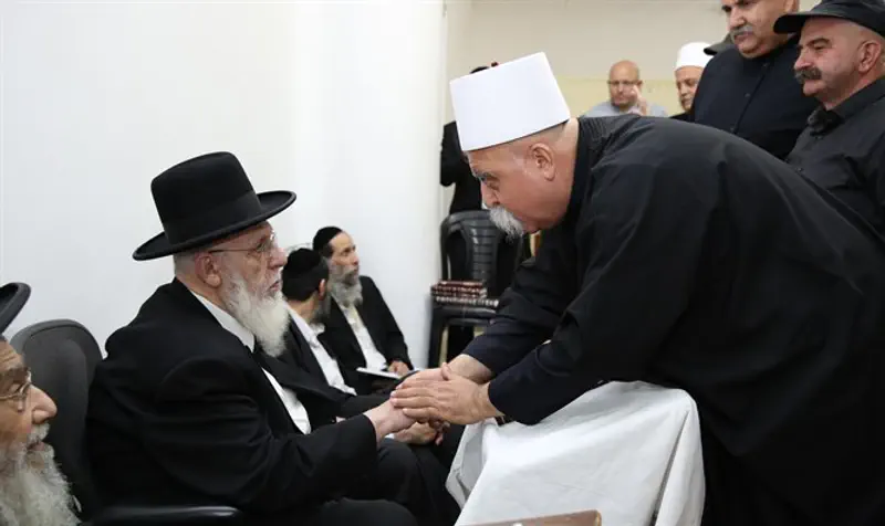 Druze leaders paying respects to mourning Rabbi Shalom Cohen
