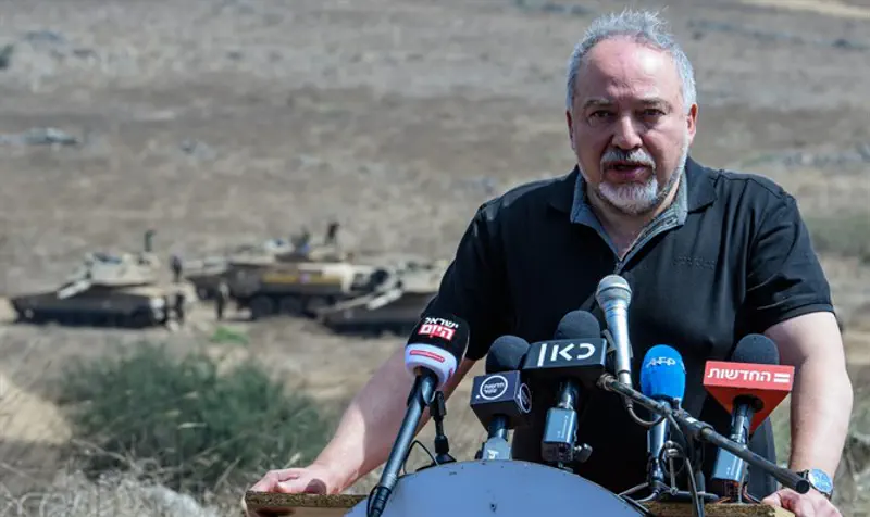 Liberman briefs reporters at exercise in north