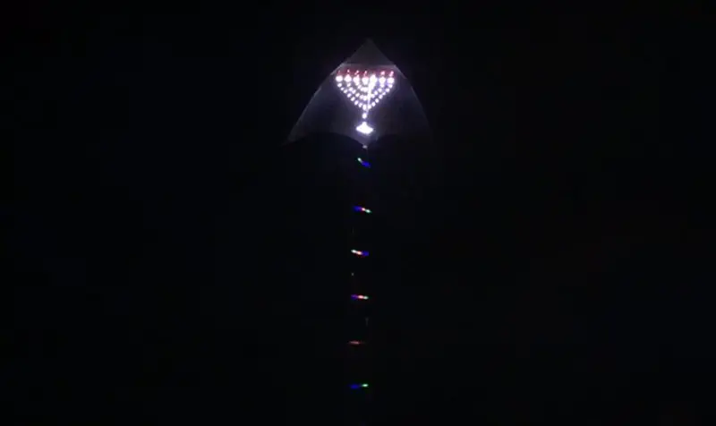 Jacob's Ladder leading up to Hanukkah menorah in Singapore skies