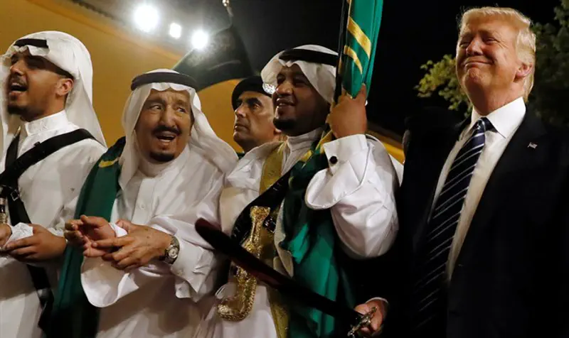 Saudi Arabia's King Salman welcomes Trump to dance with sword during welcome