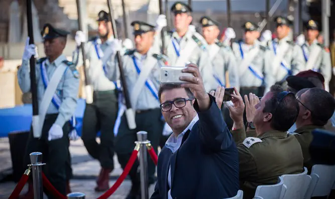 Hazan takes selfie picture during ceremony for Jerusalem Day at Western Wall