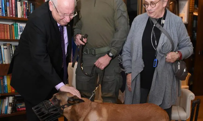 Rivlin and his wife with Rambo