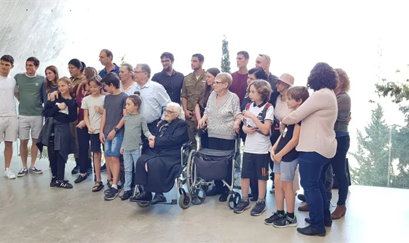 Rescuer with survivors and their descendants