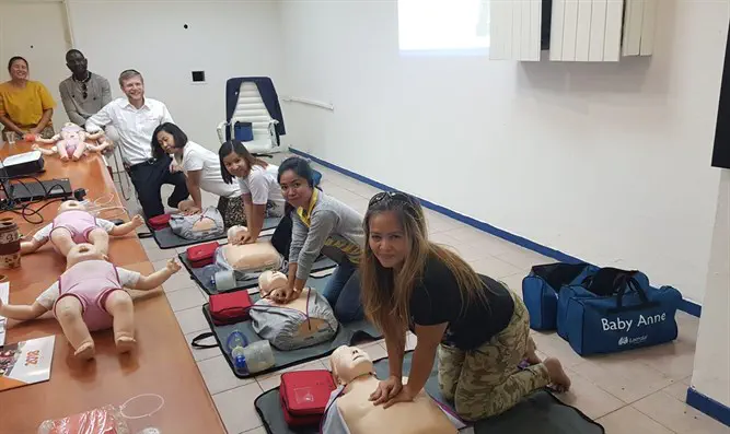 Foreign workers receive CPR training