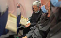 A special Megillah reading on an airplane headed for Ukraine