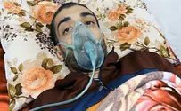 Hamas releases video showing captive Israeli in hospital bed