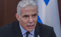 Lapid promises government aid to Lod after deadly shootings