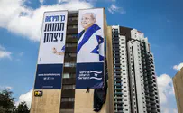 אחמד טיבי ואיימן עודה עטופים בדגלי ישראל
