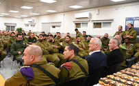 Gantz lights Hanukkah candle with soldiers in Samaria 