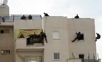 Counterterror officers save man who sought to jump off building