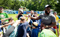 Super Bowl champ makes surprise visit to special needs camp