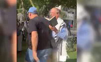 Protester assaults bereaved father as he prayed