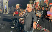 Watch: Shlomo Artzi sings 'Hatikvah' with hostages' families