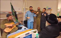 Karliner Rebbe sings with seriously wounded soldier