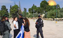Police arrested girl who hung Israeli flag over her shoulders