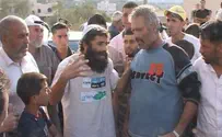 Settlers Visit Arab Town, Condemn Arson