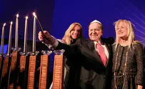 Adelsons Light Hanukkah Candles with Taglit Participants
