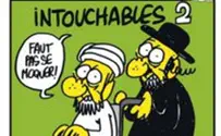 New Cartoon: Jew Pushes Mohammed in Wheelchair