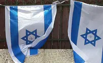 Swastika 'Price Tag' on Israeli Flags in Heart of Jerusalem
