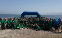 Hundreds Swim the Kinneret to Help Special Needs Young Adults