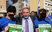 Liberman Displays Banned Charlie Hebdo in Tel Aviv