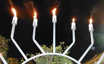 Women of the Wall light Hanukkah candles at Kotel
