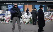 Hyper Cacher terror victims light menorah at Paris unity concert