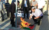 Ex-MK, right-wing activists burn PLO flag in front of IDF HQ