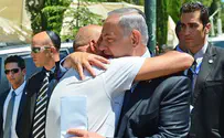 Netanyahu hugs terror victim's brother despite outburst