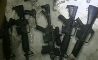 Security forces seize weapons smuggled from Jordan