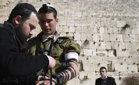 The 'holy city' of Tel Aviv dons tefillin, may break records
