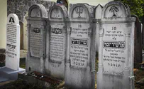 73 headstones smashed at fire-ravaged Romanian Jewish cemetery