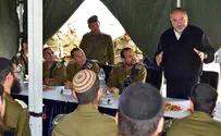 Defense Minister visits haredi soldiers, backs Kfir commander