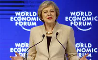 May wins election but loses majority