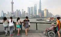 China to raise limits on children per family to 3