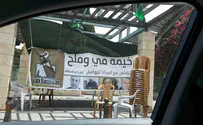 Terror banner, flags wave unhindered in Israeli town