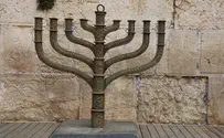 Watch: Giant Hanukkah menorah set up at Western Wall