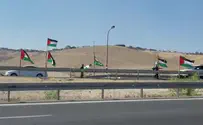 Hundreds of PLO flags fly on road to Jerusalem