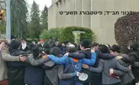 Watch: Chabad students gather at site of synagogue shooting