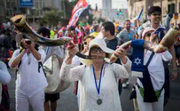 Sparks fly as missionaries try to convert rabbi at Israel Parade