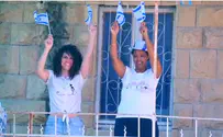 Watch: Dancing on balconies, with Israeli flags