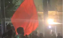 Celebrating Biden win with red flags in Zion Square